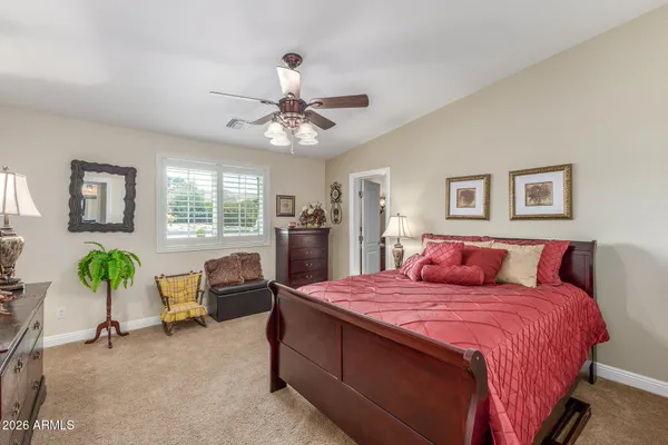 a bed room with a bed and furniture