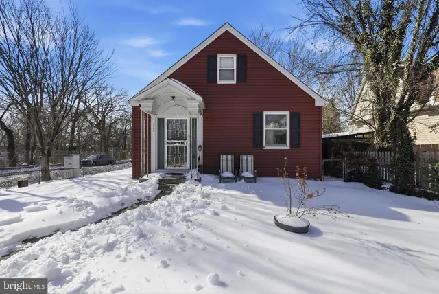 a backyard of a house with yard and trees