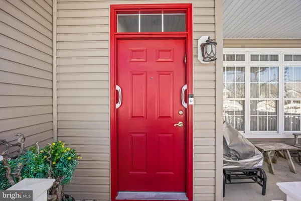a view of a house with a door and chair