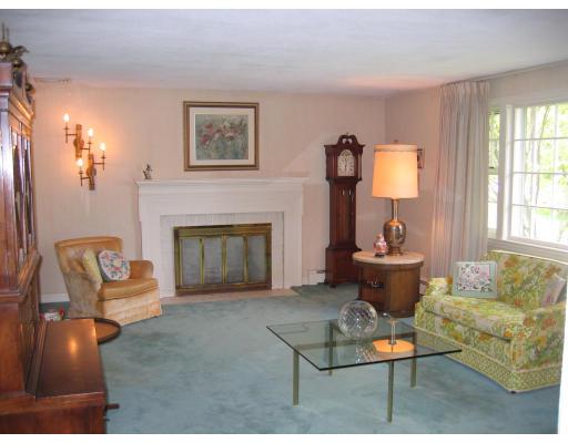 14 Belmont Road Wakefield, MA 01880 - Photo 4 of 15 a living room with furniture and a fireplace