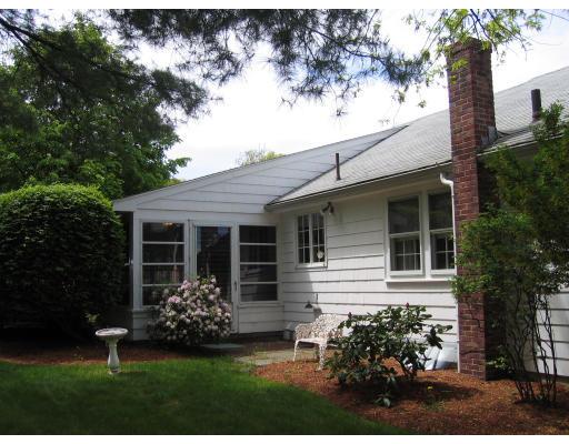 14 Belmont Road Wakefield, MA 01880 - Photo 9 of 15 a front view of a house with a garden and trees