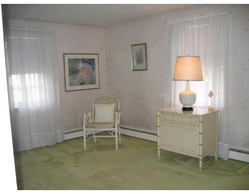 14 Belmont Road Wakefield, MA 01880 - Photo 10 of 15 a bedroom with a bed and a window