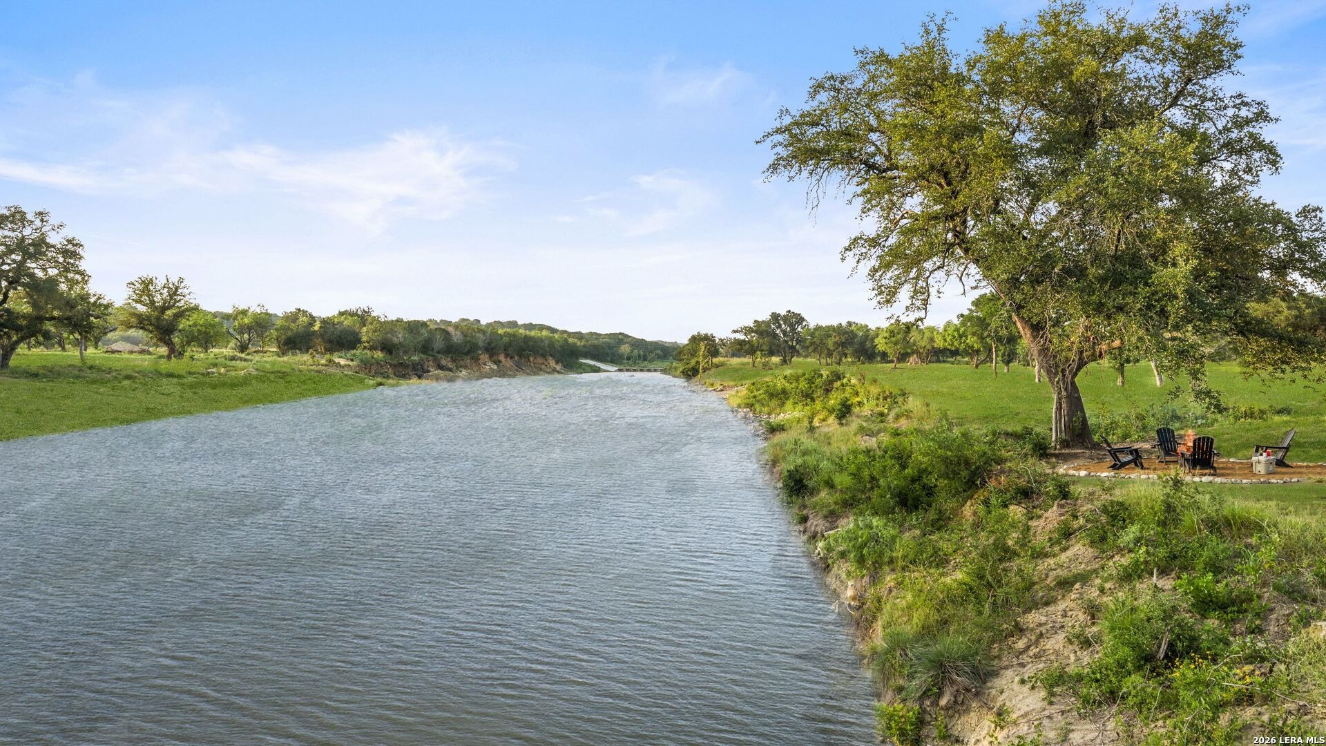 3402 Mormon Mill Road Marble Falls, TX 78654 - Photo 21 of 29 a view of a big yard with plants and large trees
