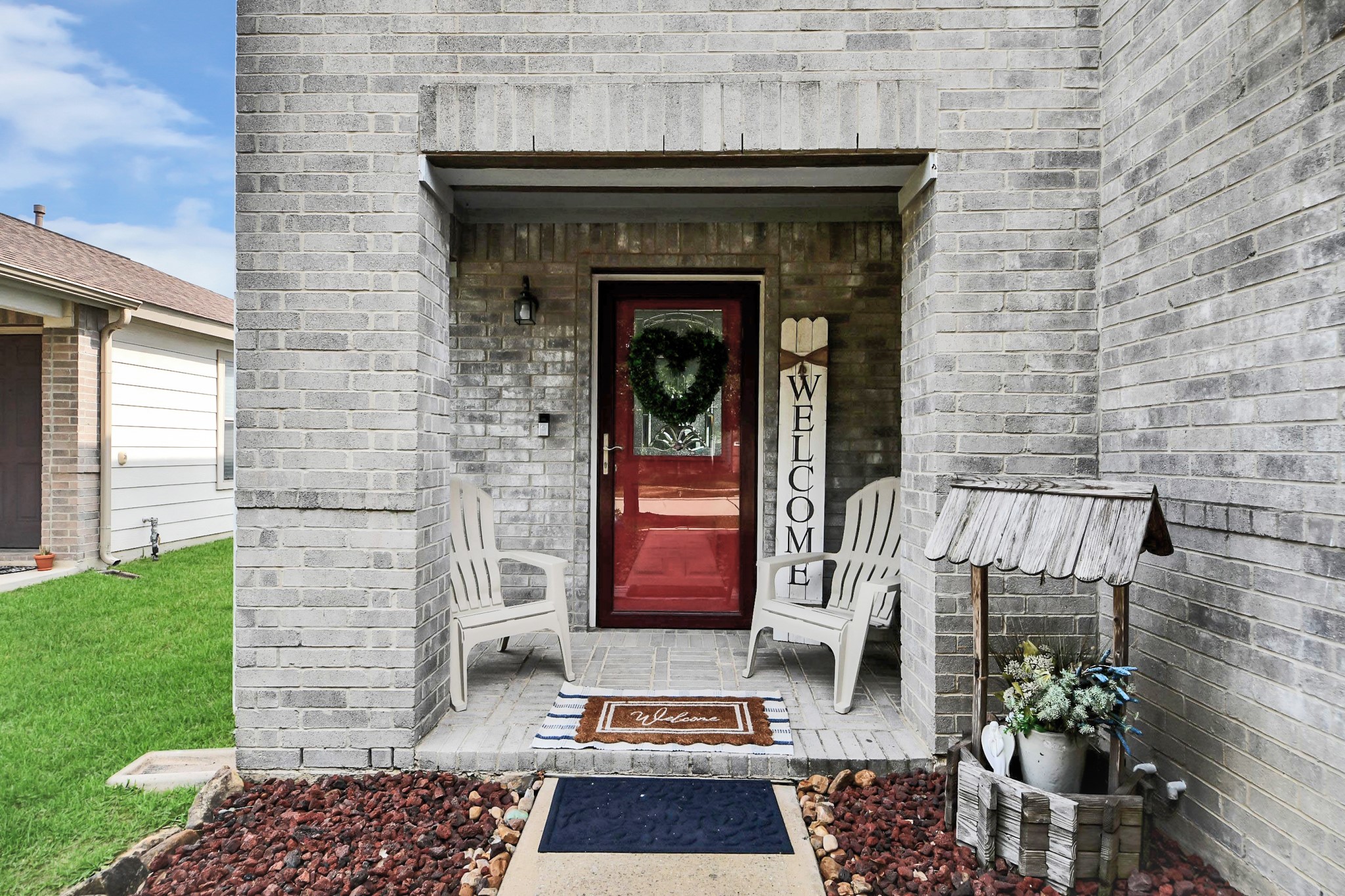 3007 Swift Brook Glen Way Spring, TX 77389 - Photo 2 of 32 Welcoming front entrance featuring a storm door, charming covered porch, and a warm, homey feel from the moment you arrive.