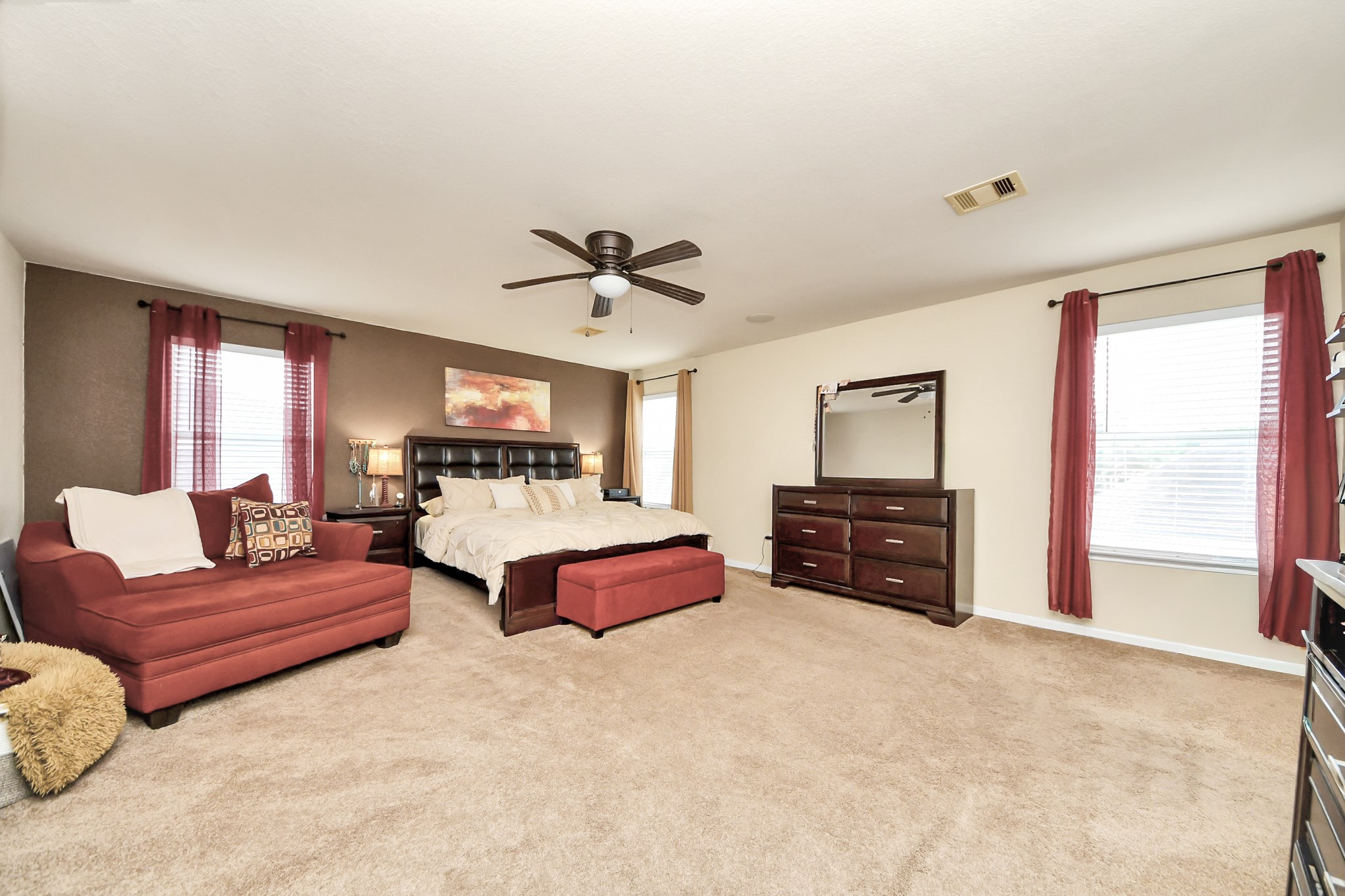 3007 Swift Brook Glen Way Spring, TX 77389 - Photo 5 of 32 Huge primary bedroom offering an incredible amount of space, natural light, and plenty of room for a sitting area or additional furniture.