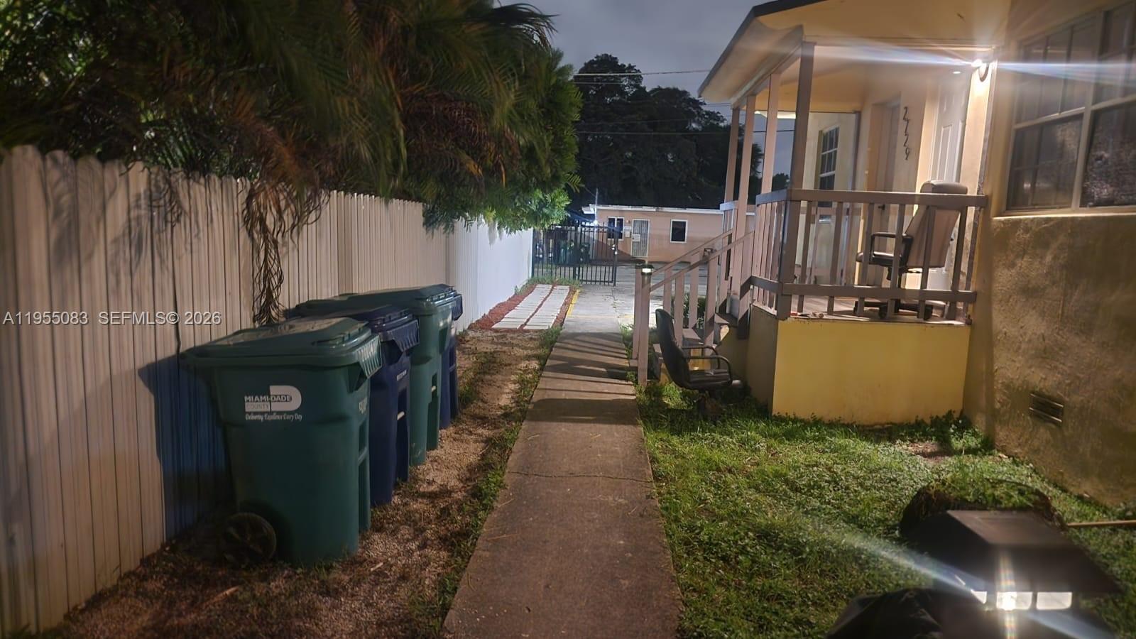 2729 Northwest 47th Street Miami, FL 33142 - Photo 18 of 34 a view of a backyard with sitting area