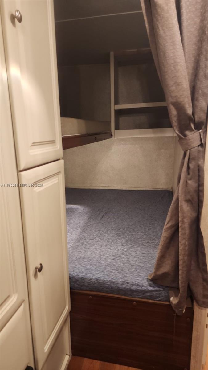 2729 Northwest 47th Street Miami, FL 33142 - Photo 25 of 34 a view of walk in closet