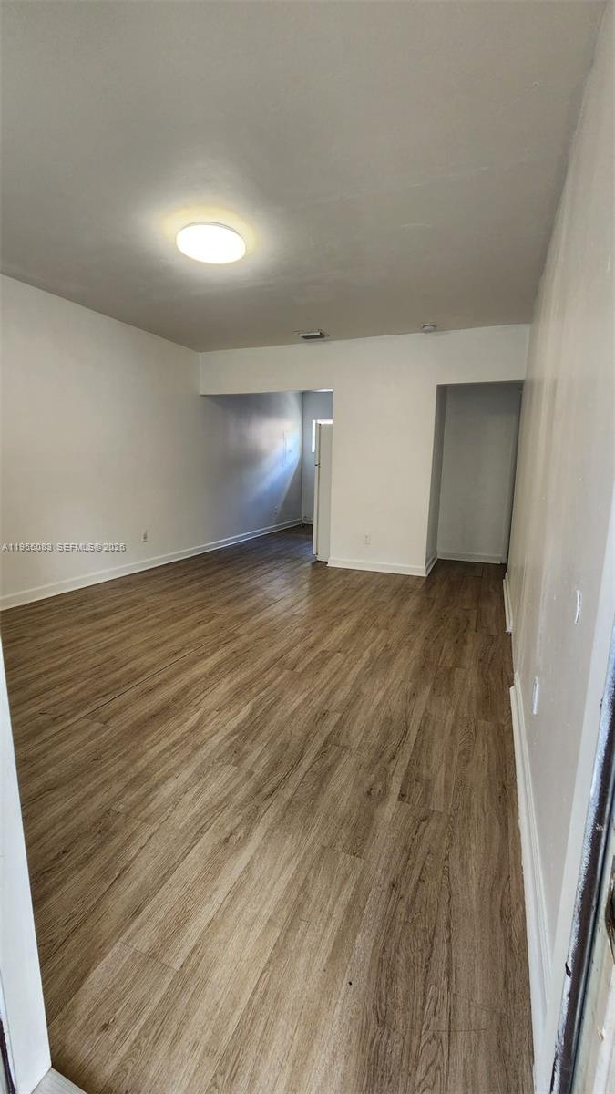 2729 Northwest 47th Street Miami, FL 33142 - Photo 26 of 34 wooden floor in a room