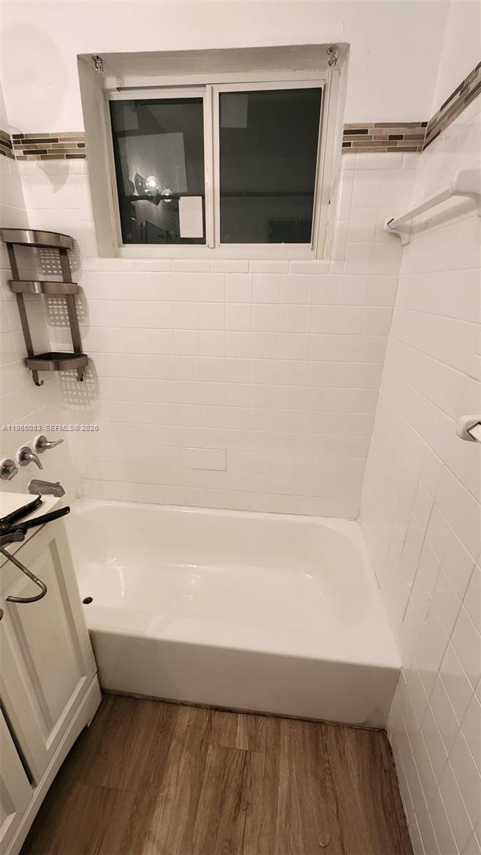 2729 Northwest 47th Street Miami, FL 33142 - Photo 31 of 34 a bathroom with a bathtub