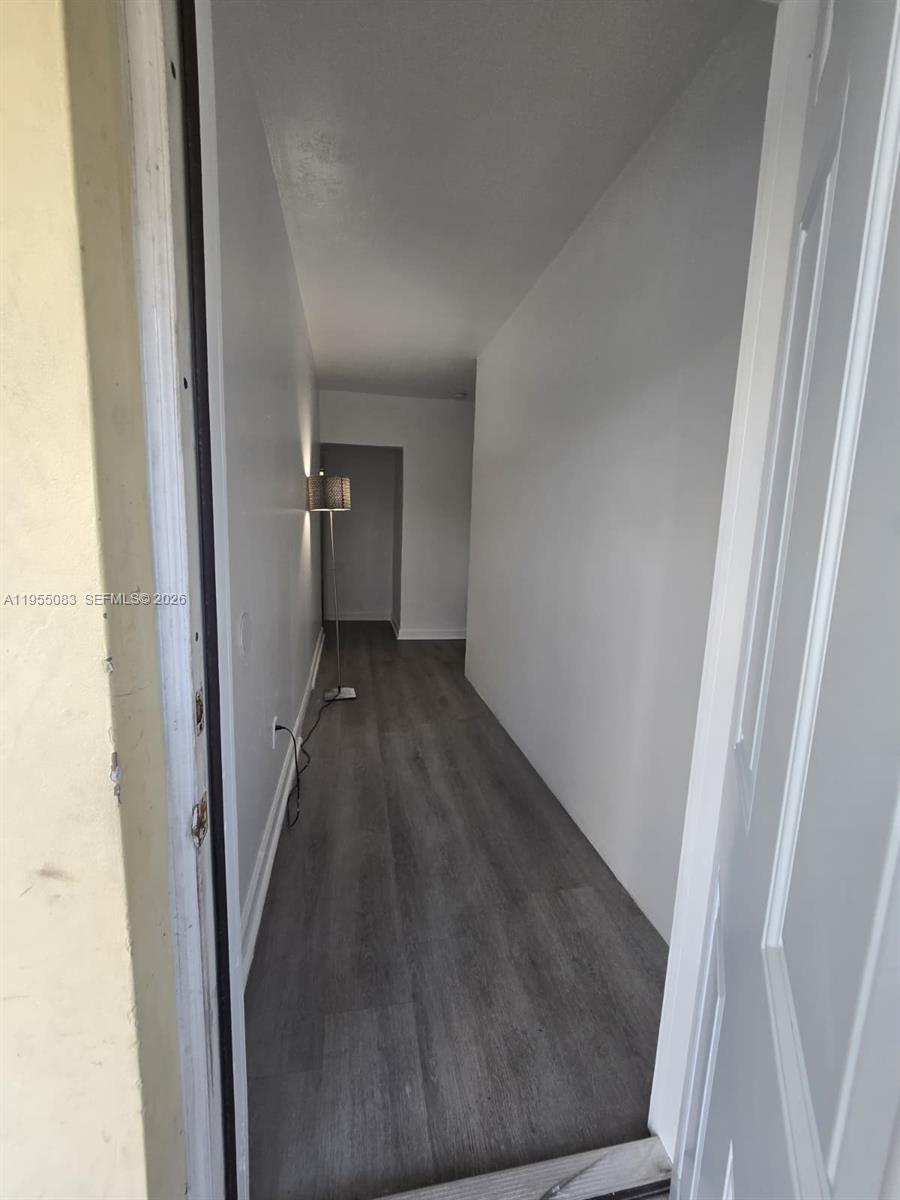 2729 Northwest 47th Street Miami, FL 33142 - Photo 6 of 34 a view of a hallway