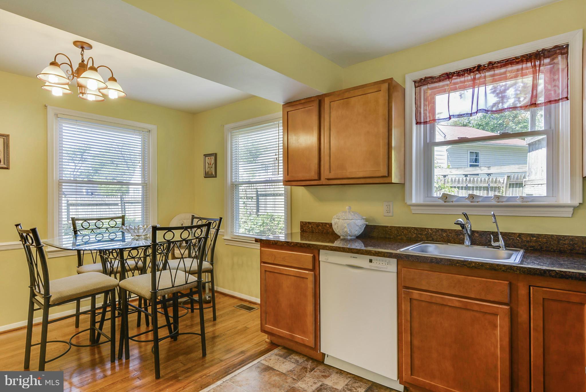 2707 Weisman Road Silver Spring, MD 20902 - Photo 12 of 30 a kitchen that has a sink and cabinets