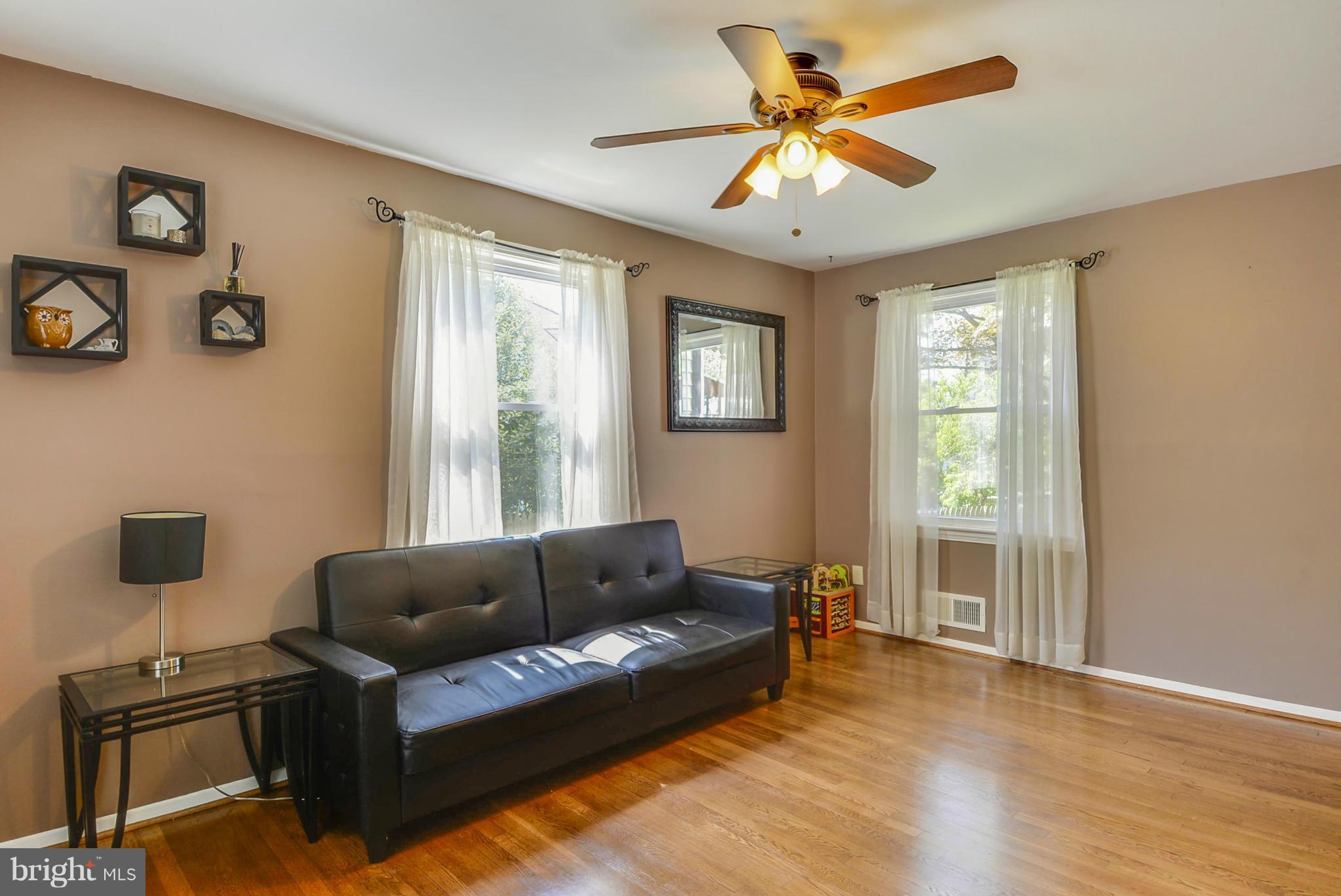 2707 Weisman Road Silver Spring, MD 20902 - Photo 13 of 30 a living room with furniture and a window