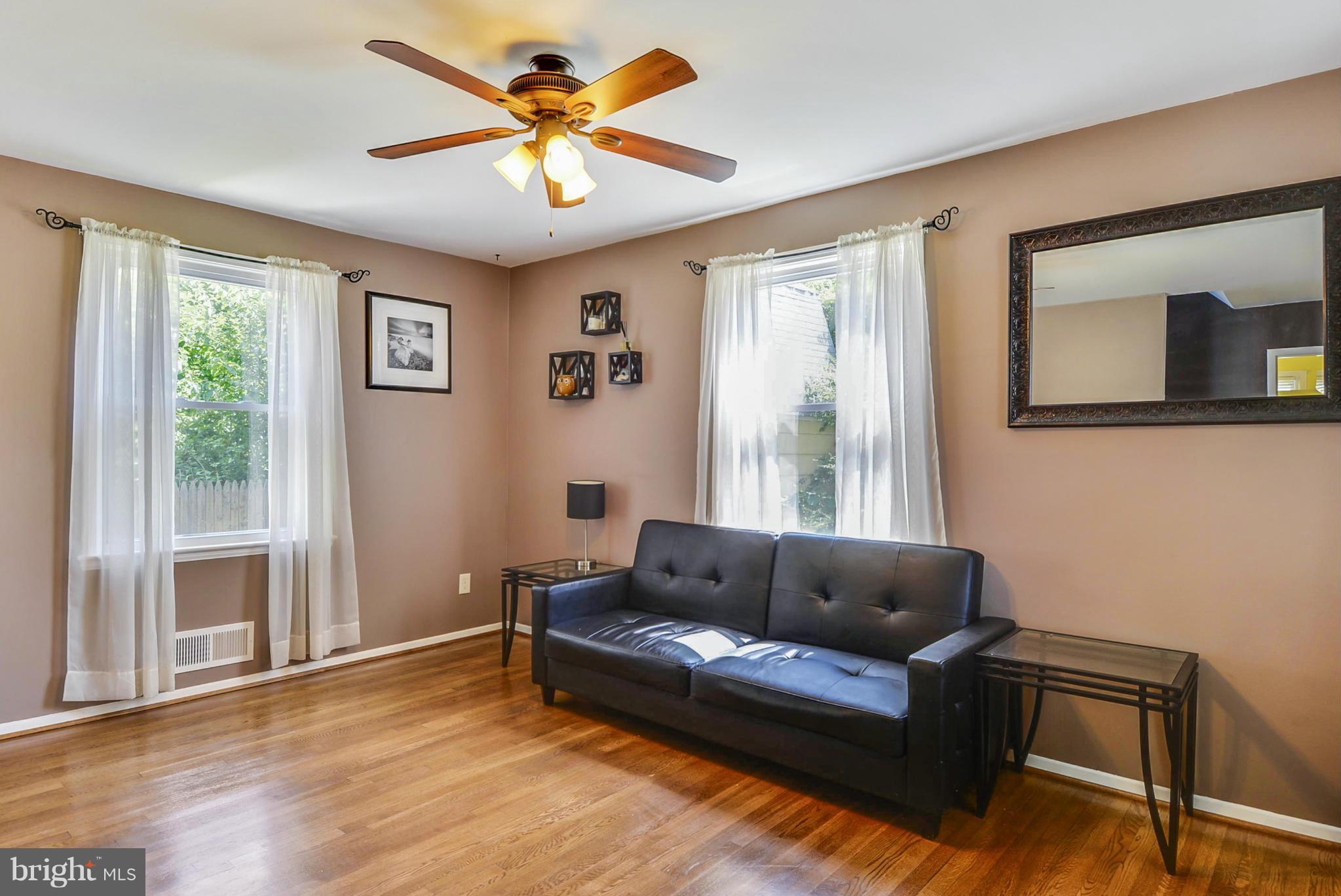 2707 Weisman Road Silver Spring, MD 20902 - Photo 16 of 30 a living room with furniture and a large window