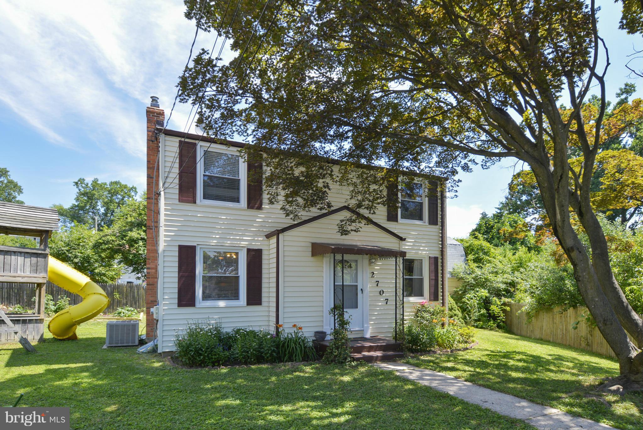 2707 Weisman Road Silver Spring, MD 20902 - Photo 3 of 30 front view of a house with a yard