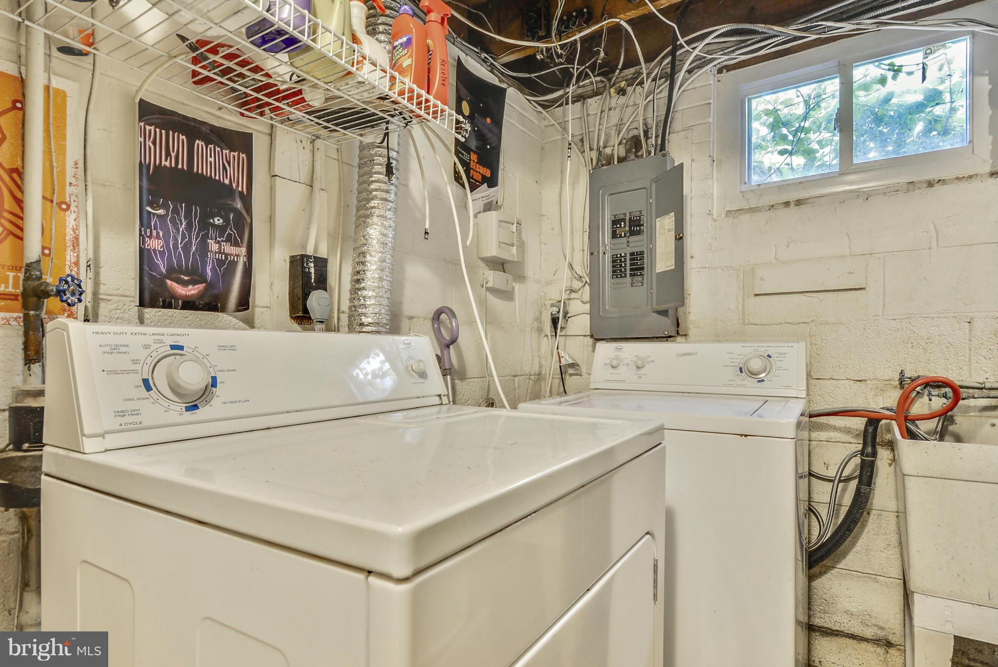 2707 Weisman Road Silver Spring, MD 20902 - Photo 27 of 30 a utility room with dryer and washer