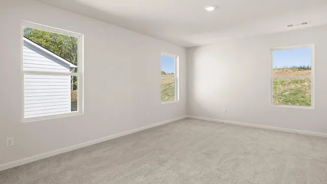 an empty room with windows