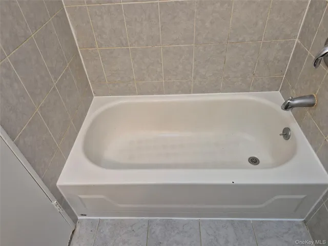 a bathroom with a bathtub