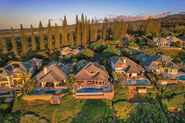 an aerial view of residential house with outdoor space and river