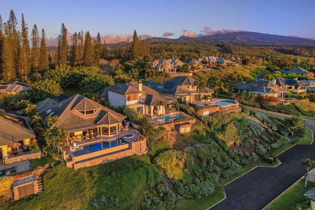 a view of a city with mountains in the background