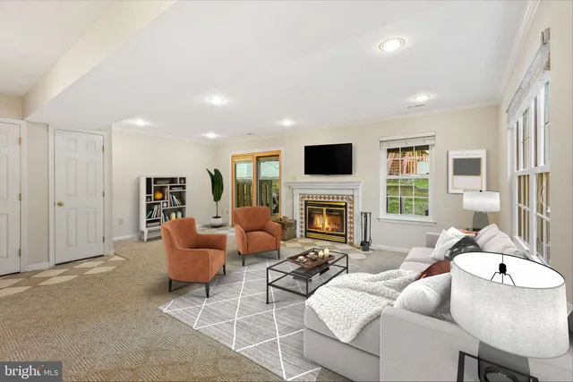 an empty room with fireplace and windows