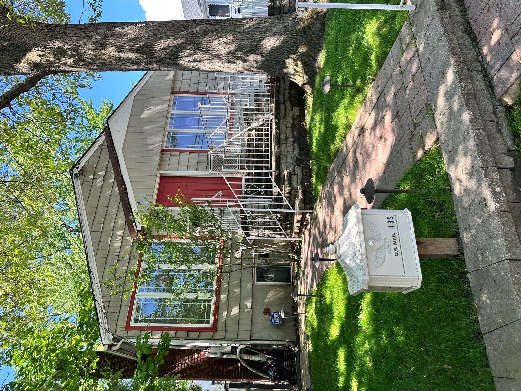 13 Linwood Road South Port Washington, NY 11050 - Photo 8 of 8 a view of a house with backyard and sitting area