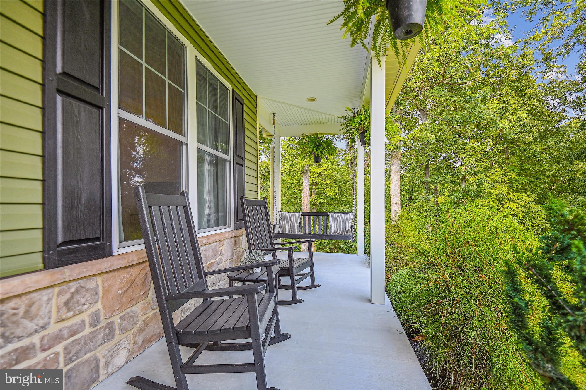 12700 Handboard Road Union Bridge, MD 21791 - Photo 11 of 74 a view of balcony with chair and potted plant