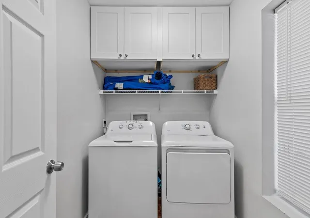a view of balcony with chair and potted plant