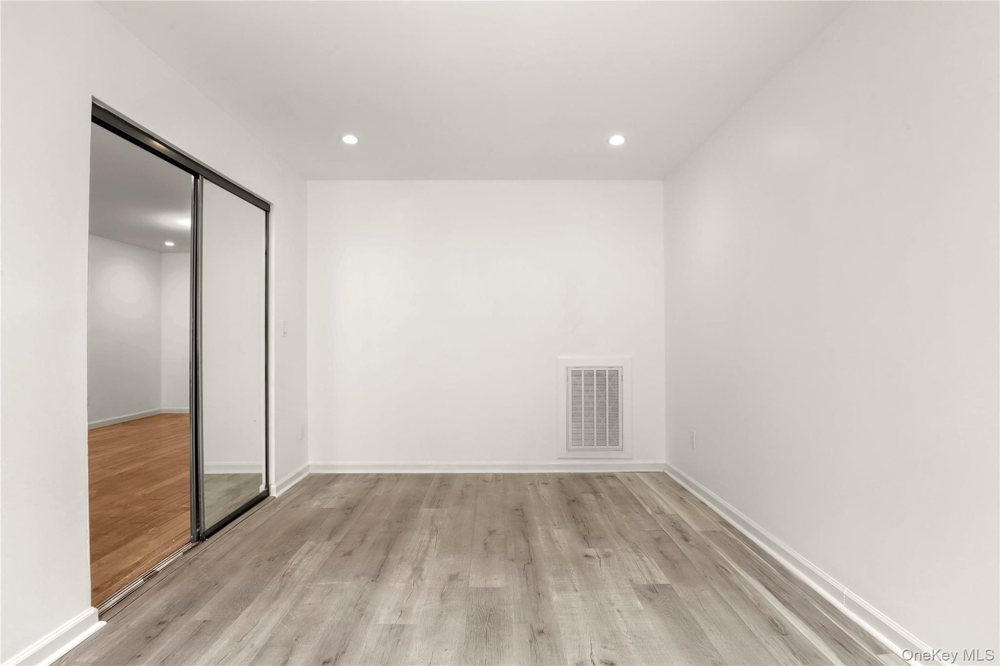 41 Rambling Brook Road Chappaqua, NY 10514 - Photo 12 of 29 Unfurnished room with light wood-type flooring, recessed lighting, and baseboards