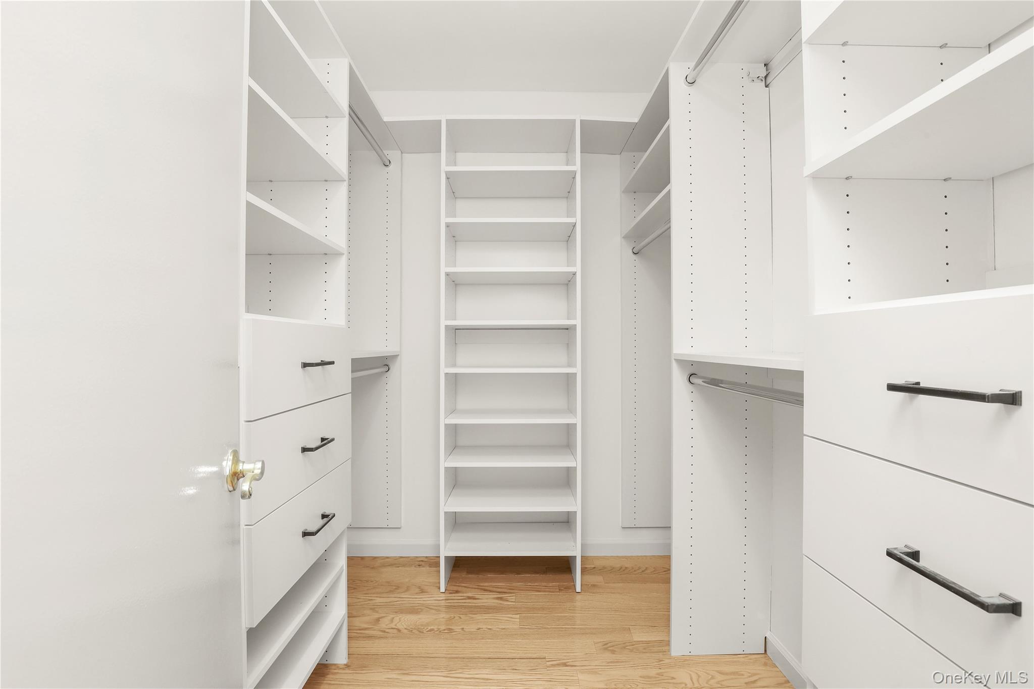 41 Rambling Brook Road Chappaqua, NY 10514 - Photo 18 of 29 Walk in closet featuring light wood finished floors