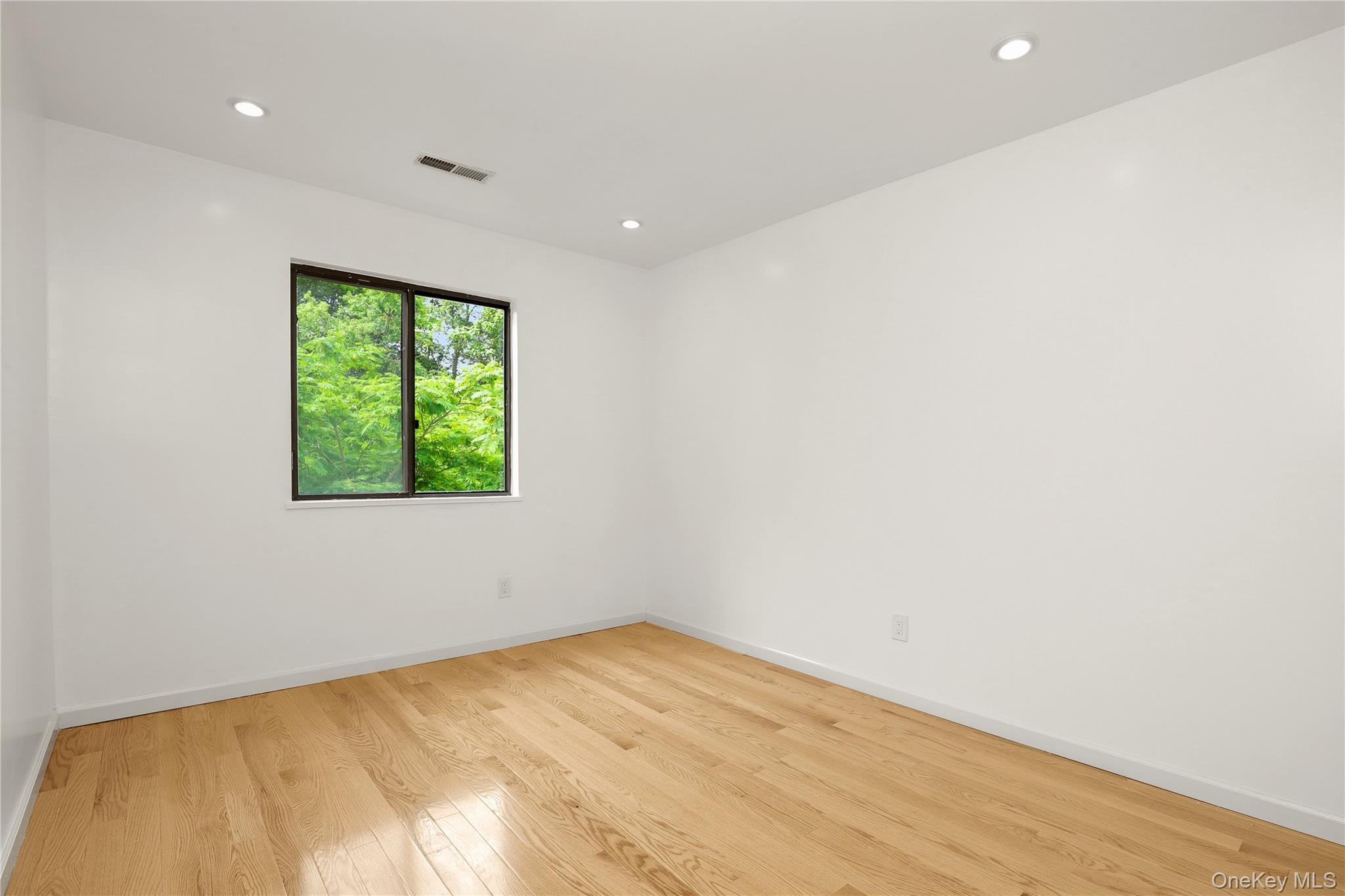 41 Rambling Brook Road Chappaqua, NY 10514 - Photo 23 of 29 Empty room with light wood-style flooring, baseboards, and recessed lighting