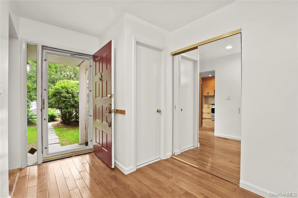 41 Rambling Brook Road Chappaqua, NY 10514 - Photo 4 of 29 Entryway with light wood-type flooring, baseboards, and recessed lighting