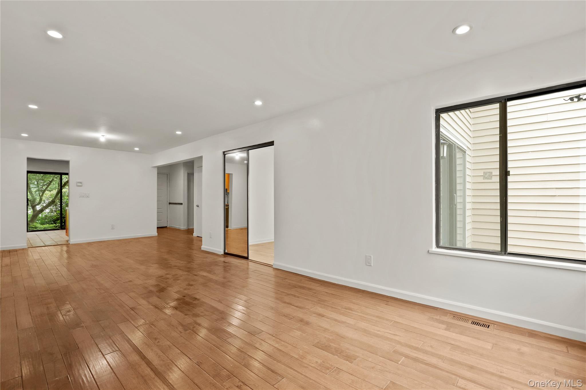 41 Rambling Brook Road Chappaqua, NY 10514 - Photo 10 of 29 Empty room with baseboards, light wood-style flooring, and recessed lighting