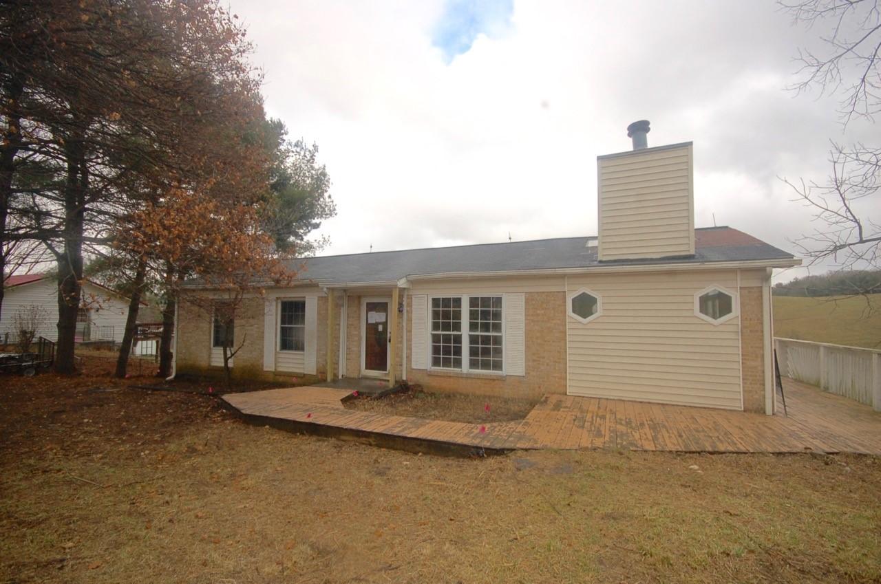 4488 Old Pike Road Pilot, VA 24138 - Photo 2 of 19 front view of house with a yard