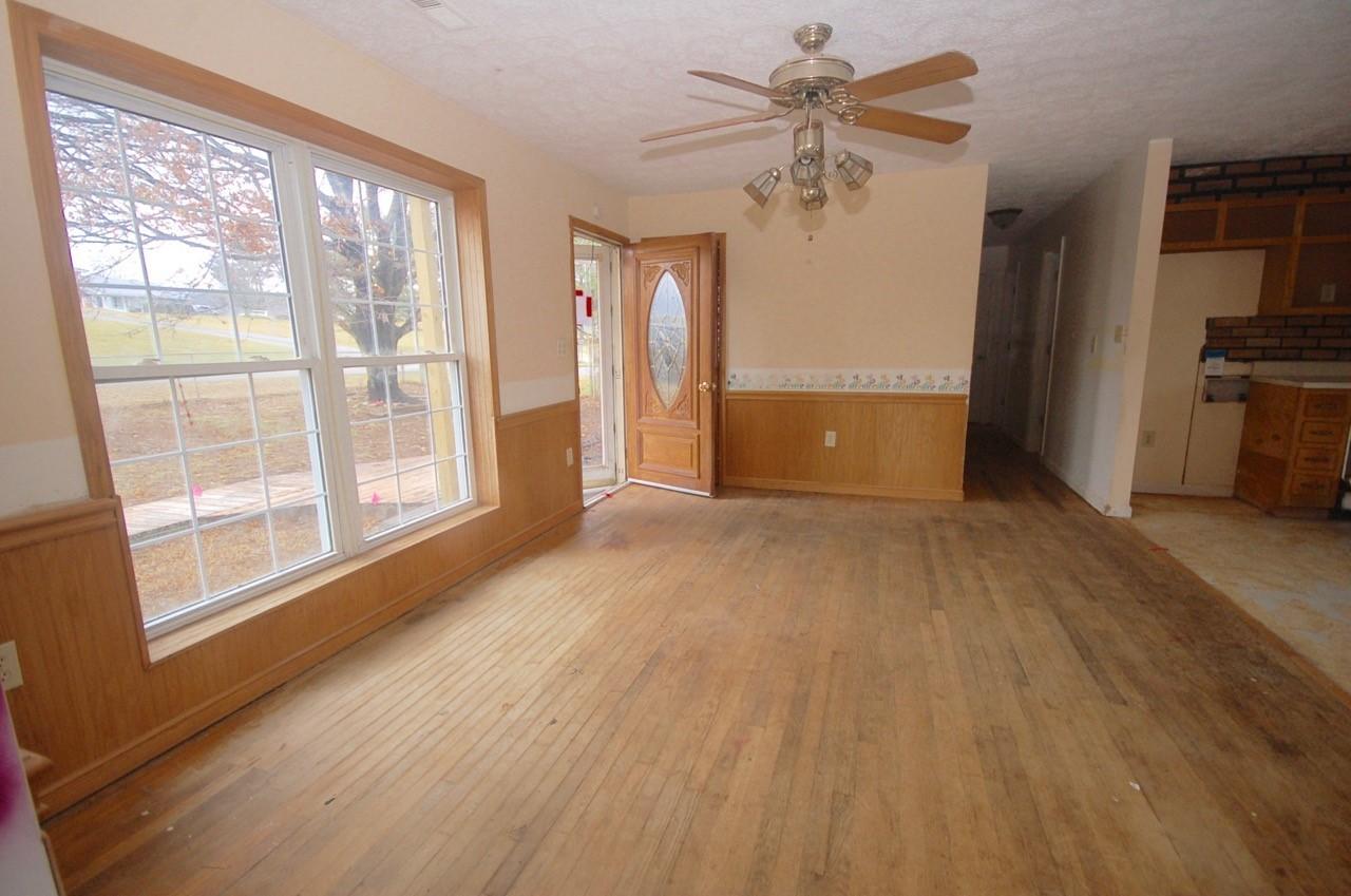 4488 Old Pike Road Pilot, VA 24138 - Photo 6 of 19 a view of livingroom with hardwood floor and a ceiling fan