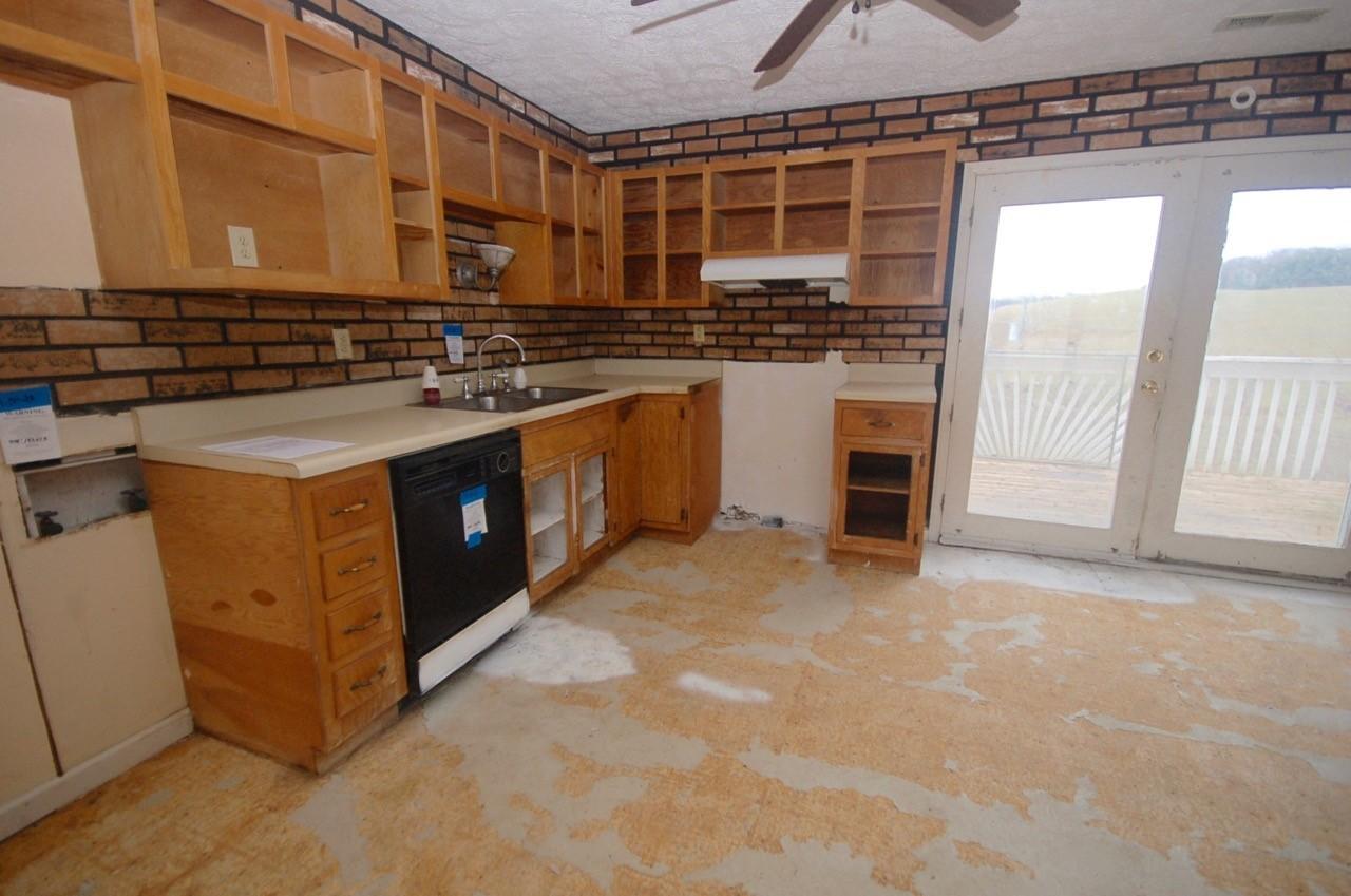 4488 Old Pike Road Pilot, VA 24138 - Photo 10 of 19 a kitchen with a stove and a sink