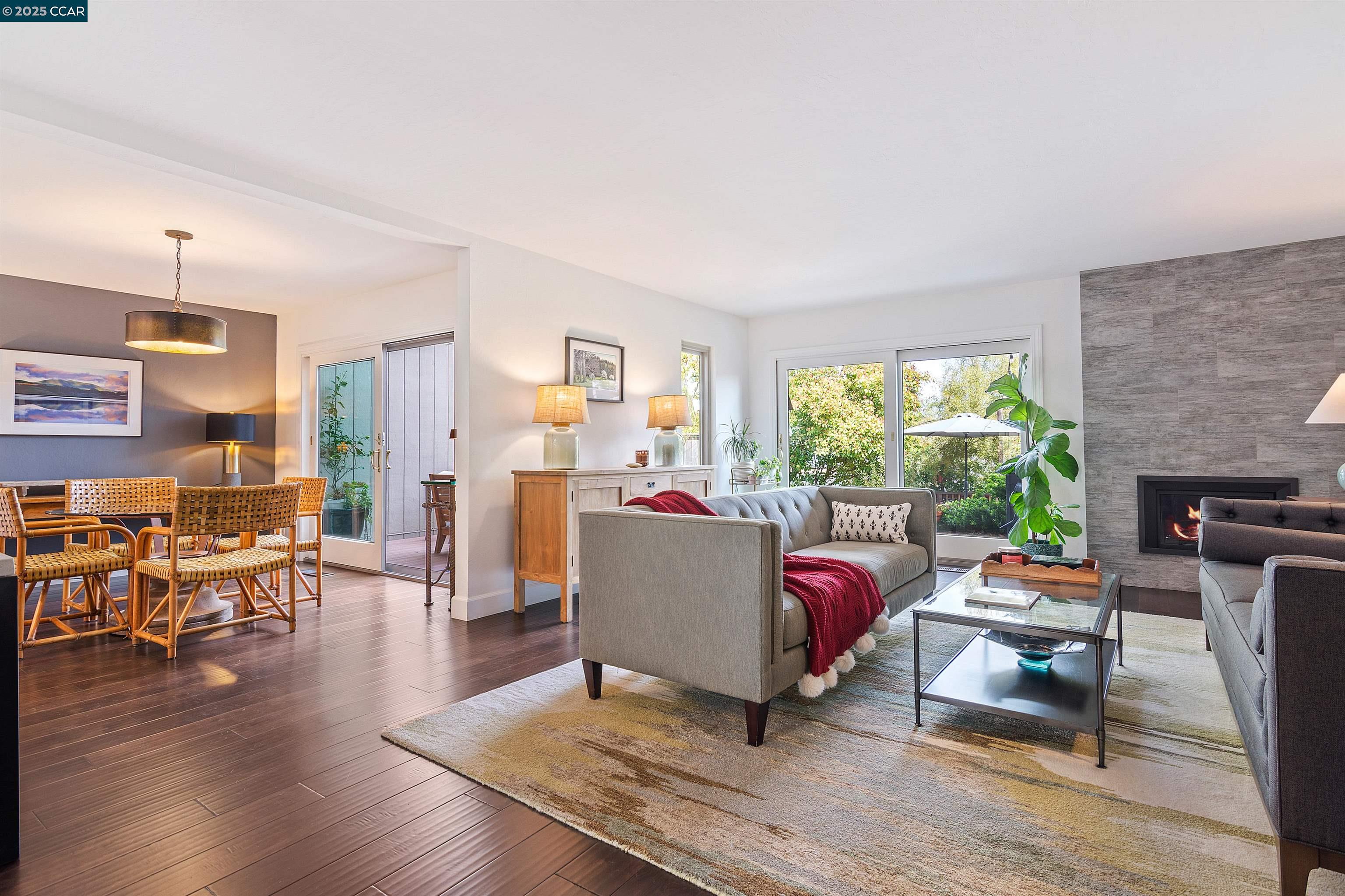 5 Doral Drive Moraga, CA 94556 - Photo 1 of 1 a living room with furniture and a fireplace