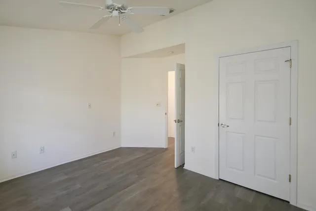 a view of a balcony with wooden floor