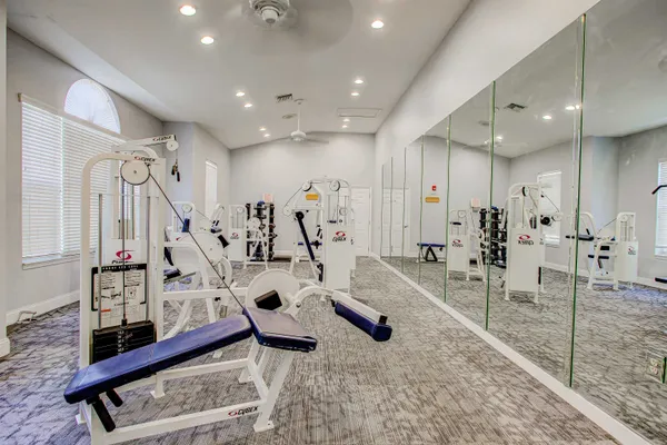 a view of a lake with houses in the back