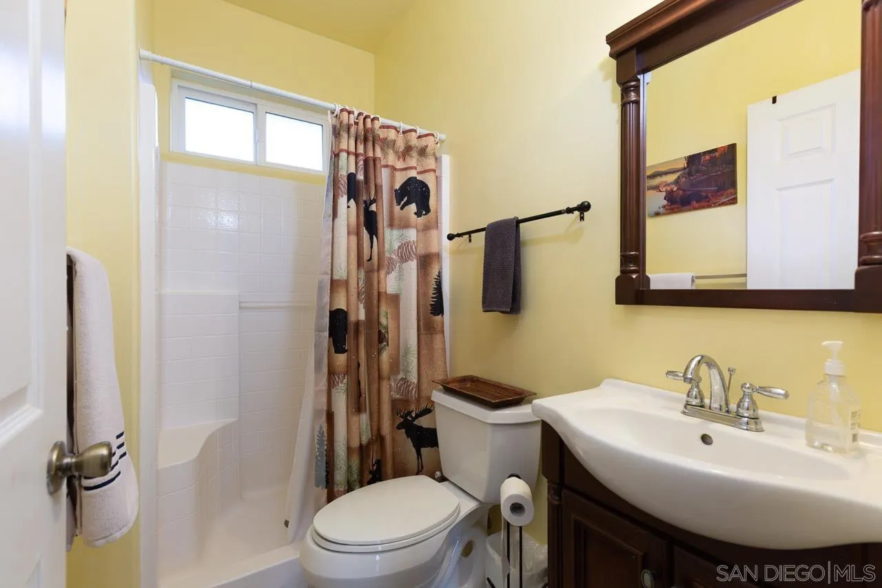 8048 High Hill Road Julian, CA 92036 - Photo 15 of 30 a bathroom with a sink toilet and shower