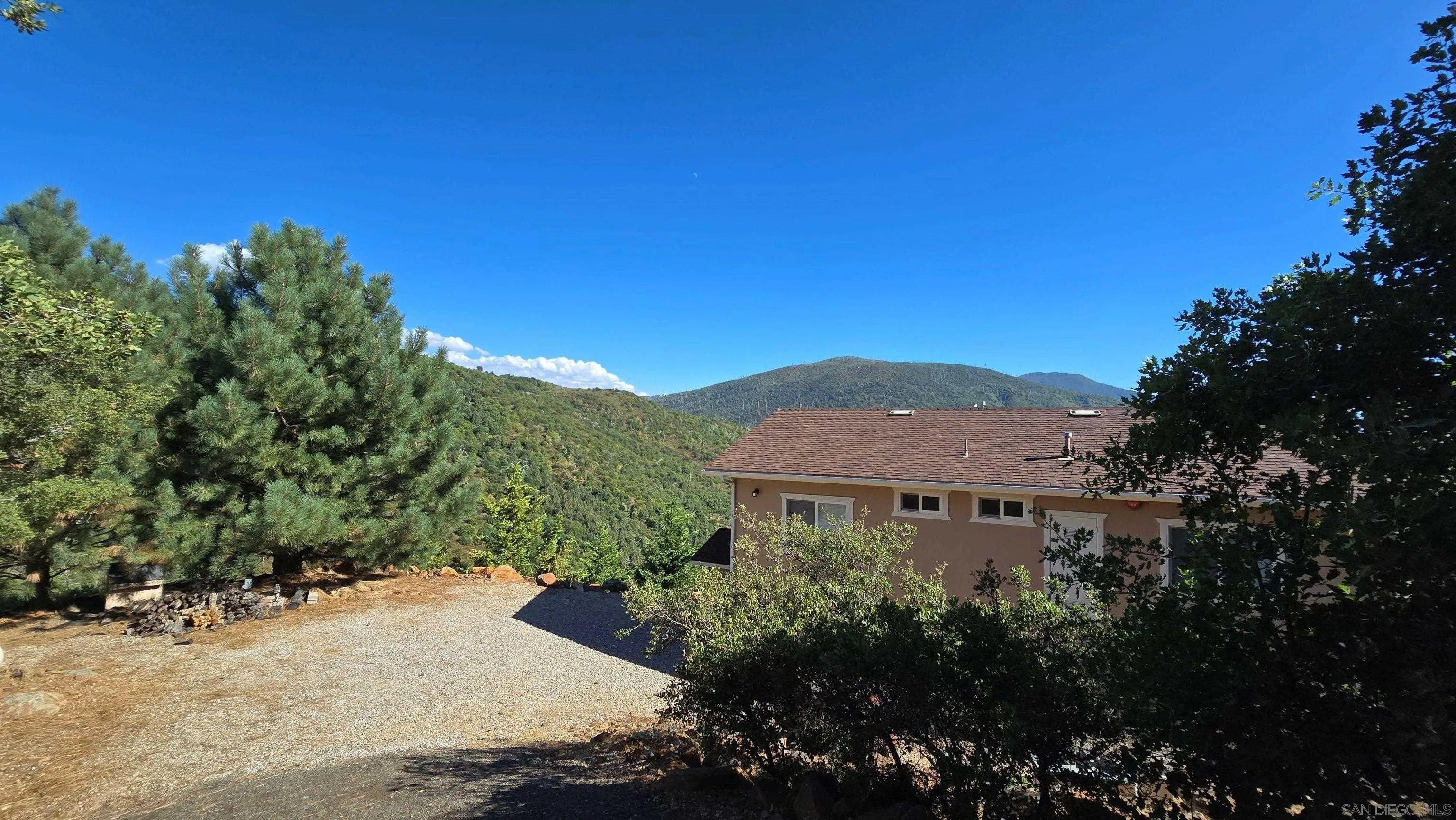 8048 High Hill Road Julian, CA 92036 - Photo 2 of 30 a view of a house with a yard
