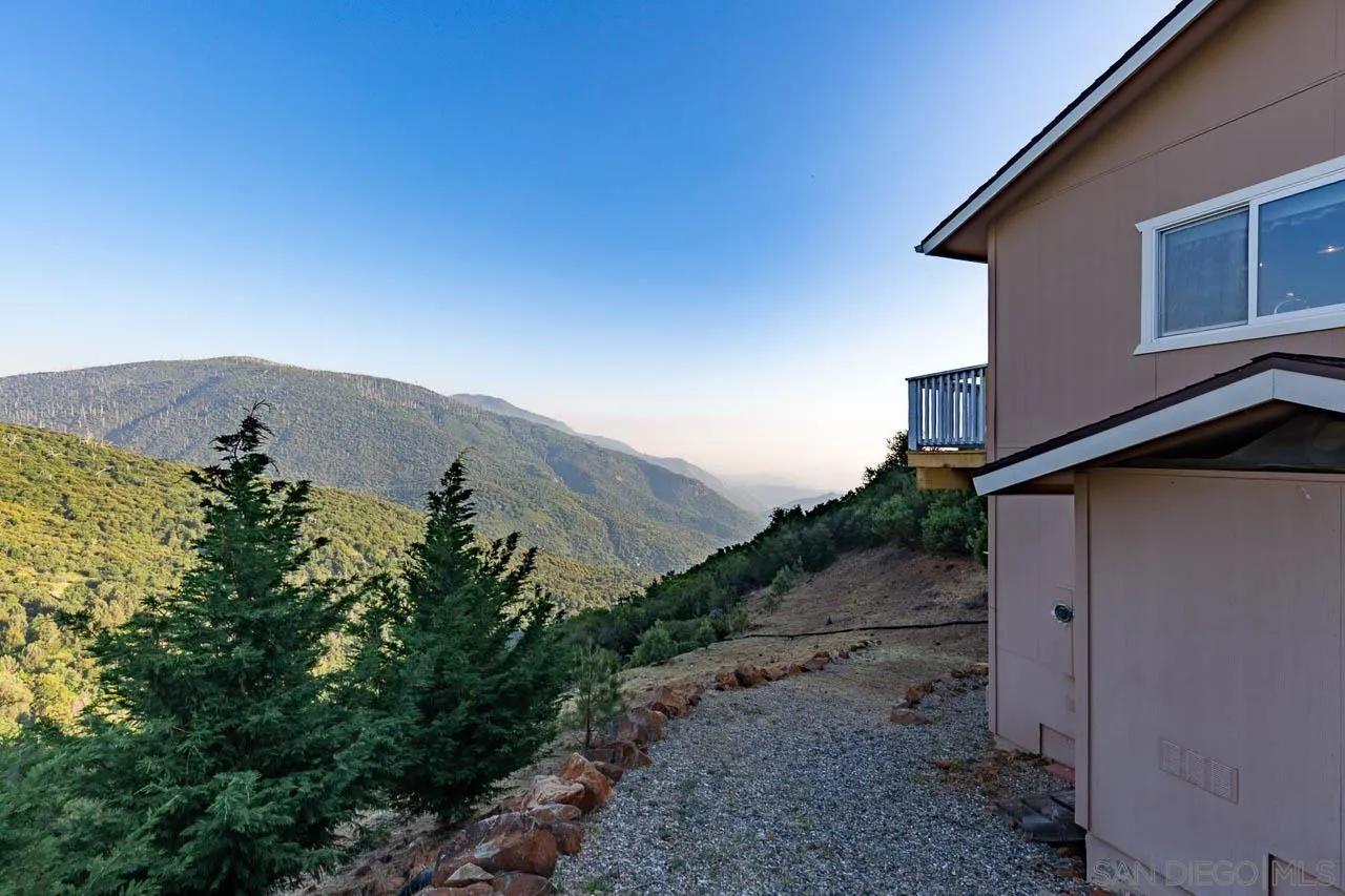 8048 High Hill Road Julian, CA 92036 - Photo 22 of 30 a view of a house with a yard