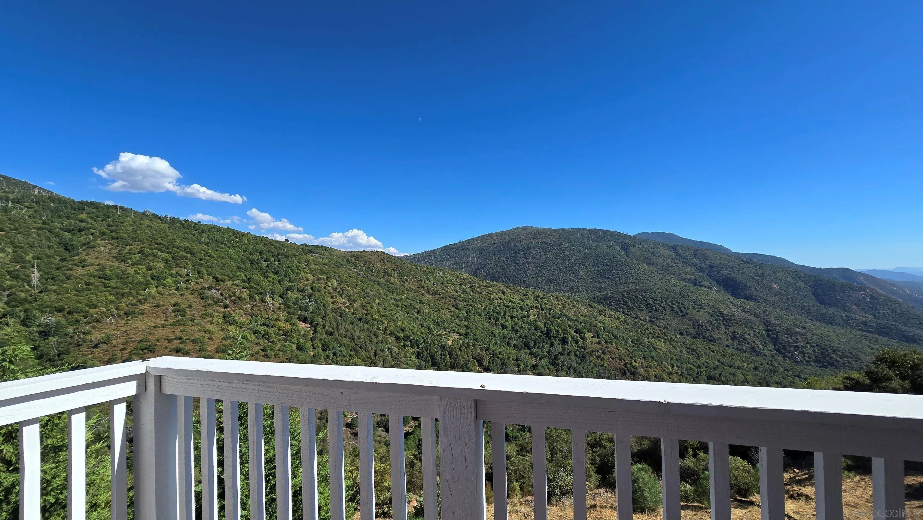 8048 High Hill Road Julian, CA 92036 - Photo 5 of 30 a view of a balcony with an outdoor space and trampoline