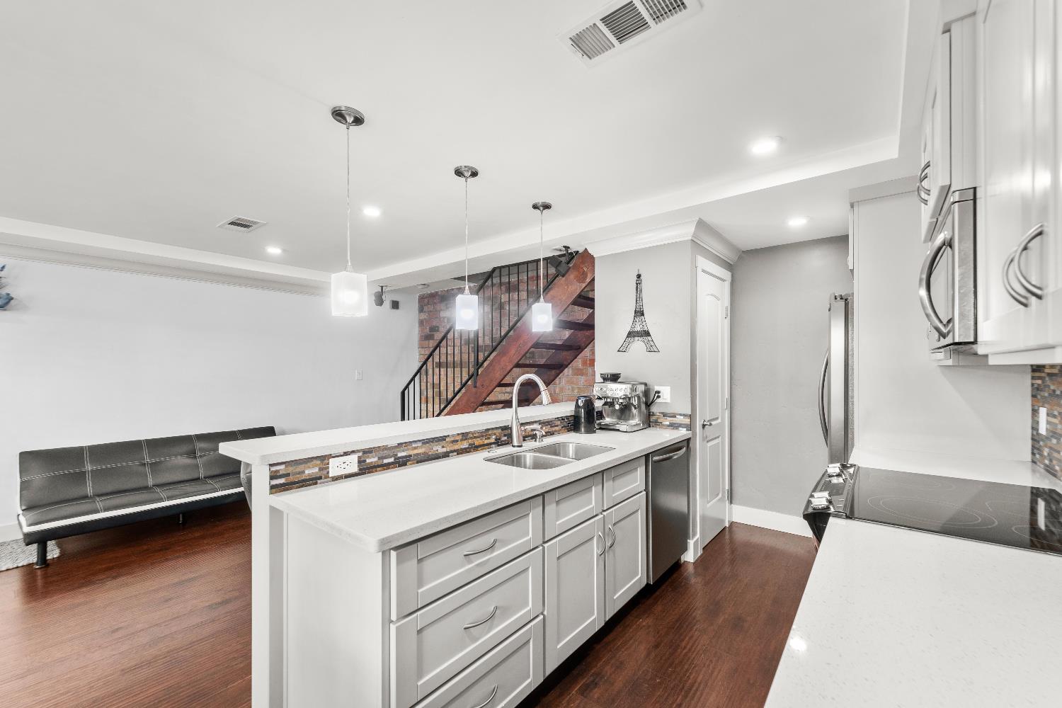 10835 Coloma Road, Unit 3 Rancho Cordova, CA 95670 - Photo 13 of 31 a view of a kitchen with sink microwave and stove