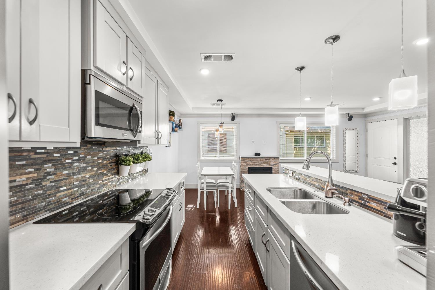 10835 Coloma Road, Unit 3 Rancho Cordova, CA 95670 - Photo 15 of 31 a kitchen with a sink stove top oven and refrigerator