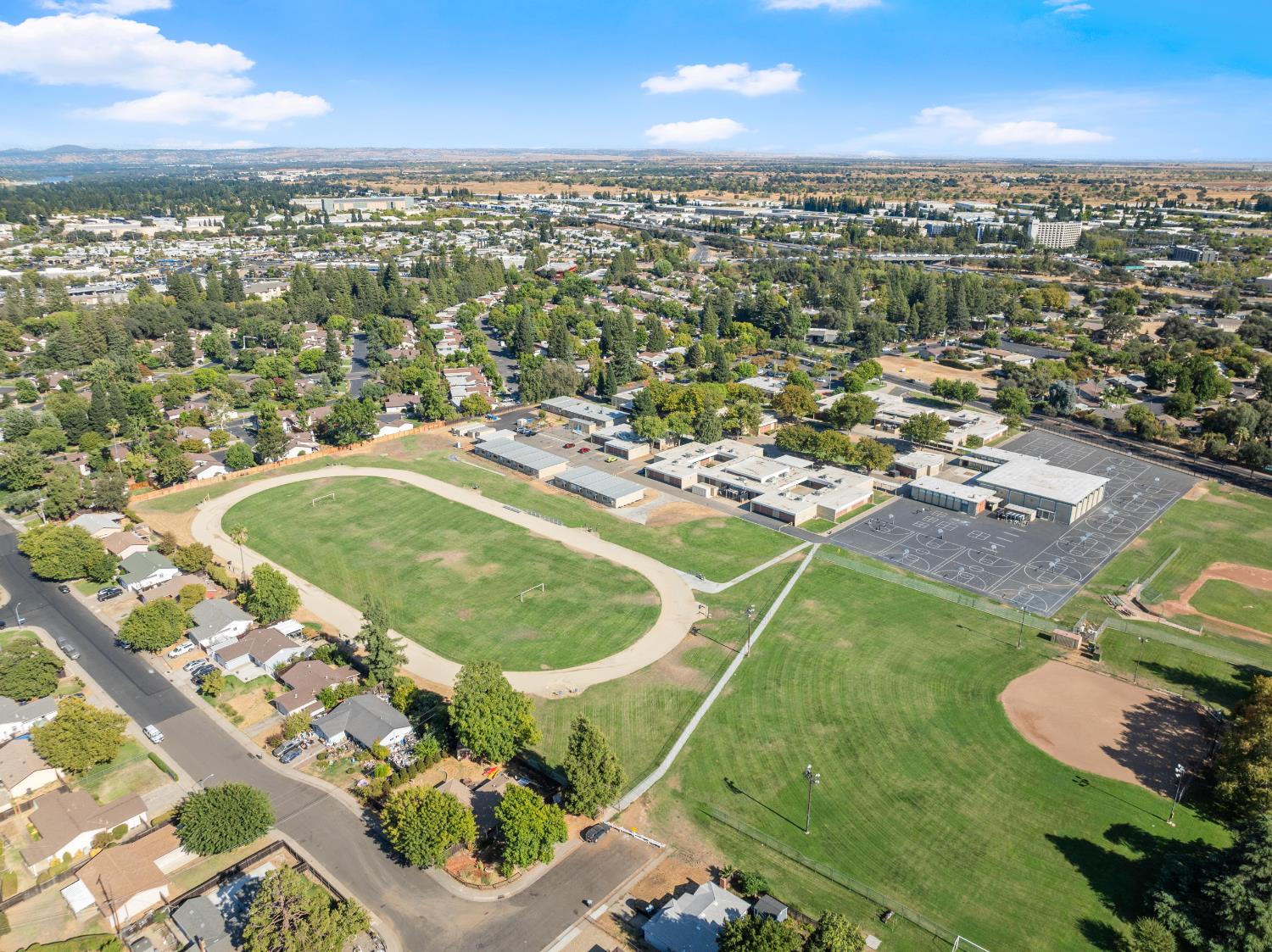 10835 Coloma Road, Unit 3 Rancho Cordova, CA 95670 - Photo 30 of 31 an aerial view of residential houses with outdoor space