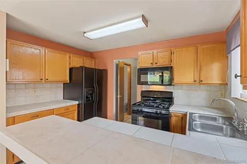 $525,000 | 5638 South Youngfield Way, Littleton, CO 80127