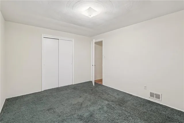 an empty room with a workspace