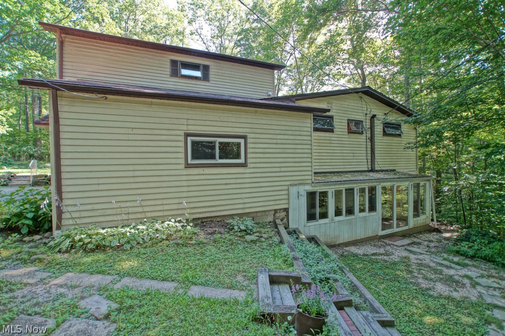 12154 Concord Hambden Road Painesville, OH 44077 - Photo 21 of 25 Side view of house