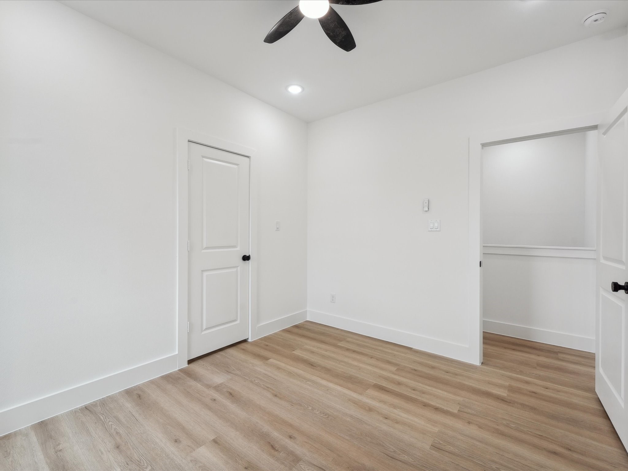 7416 Maxroy Street Houston, TX 77088 - Photo 27 of 41 wooden floor in an empty room
