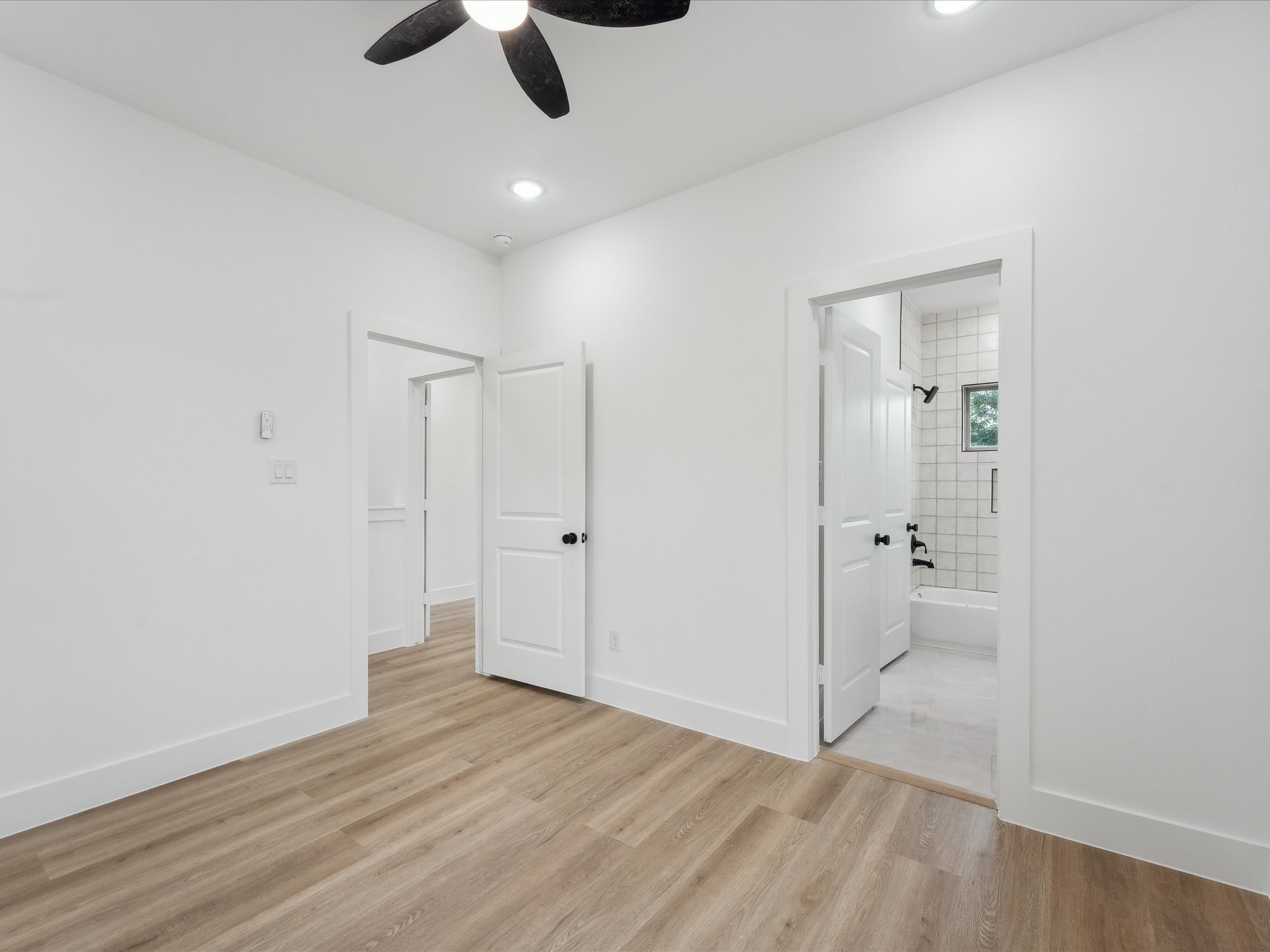 7416 Maxroy Street Houston, TX 77088 - Photo 28 of 41 wooden floor in an empty room